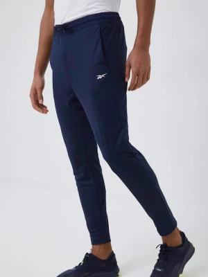 Zdjęcie produktu Reebok spodnie dresowe ID TRAIN męskie kolor granatowy gładkie GJ0840.100042384
