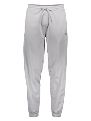 Reebok Spodnie dresowe "Vector" w kolorze szarym rozmiar: XL
