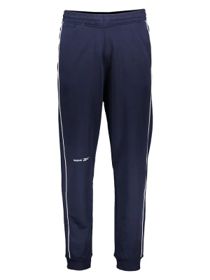 Reebok Spodnie dresowe w kolorze granatowym rozmiar: M