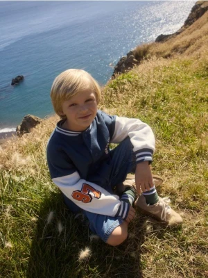 Reserved - Bawełniana bluza bomber SmileyWorld® - granatowy