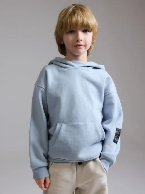 Zdjęcie produktu Reserved - Bawełniana bluza z kapturem - jasnoturkusowy