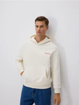 Reserved - Bawełniana bluza z kapturem SUPERMAN™ - złamana biel