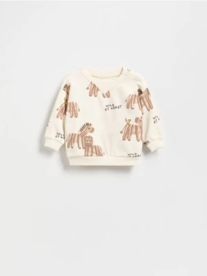 Reserved - Bawełniana bluza z nadrukiem - kremowy