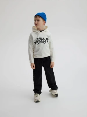 Reserved - Bawełniana bluza z nadrukiem - złamana biel