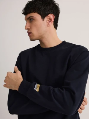 Zdjęcie produktu Reserved - Bawełniana bluza z naszywką - granatowy