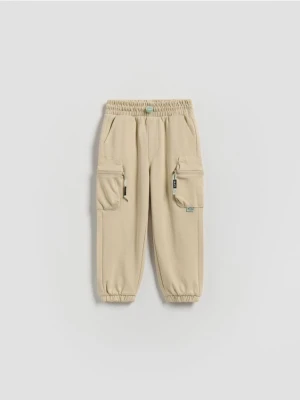 Reserved - Bawełniane joggery cargo - beżowy