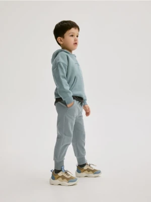 Reserved - Bawełniane joggery - ciemny turkus