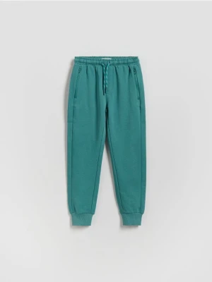 Reserved - Bawełniane joggery - morski