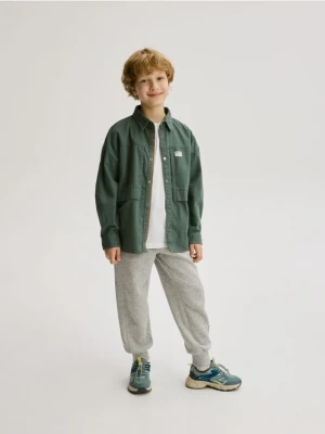 Reserved - Bawełniane joggery z meszkiem - jasnoszary