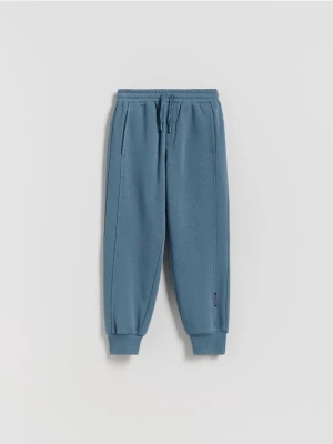 Reserved - Bawełniane joggery z meszkiem - niebieski