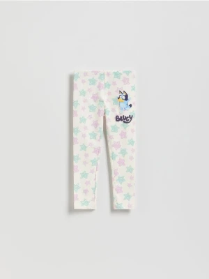 Reserved - Bawełniane legginsy Bluey - złamana biel