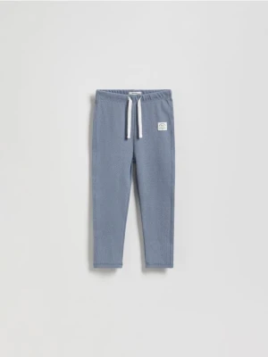 Reserved - Bawełniane legginsy z naszywką - niebieski