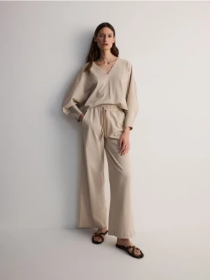 Zdjęcie produktu Reserved - Bawełniane spodnie - beżowy