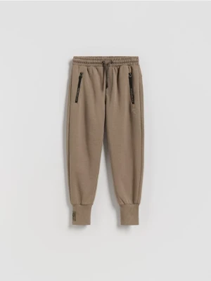 Reserved - Bawełniane spodnie - brązowy