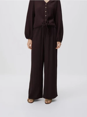 Reserved - Bawełniane spodnie - ciemnobrązowy