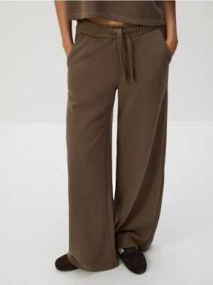 Reserved - Bawełniane spodnie dresowe - brązowy