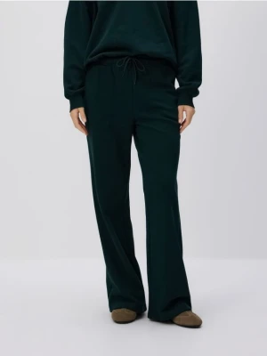 Reserved - Bawełniane spodnie dresowe - morski