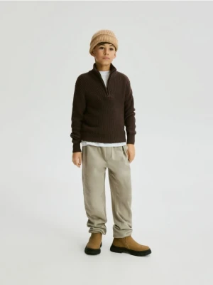 Reserved - Bawełniane spodnie jogger - beżowy