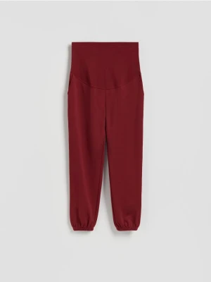 Reserved - Bawełniane spodnie jogger - bordowy