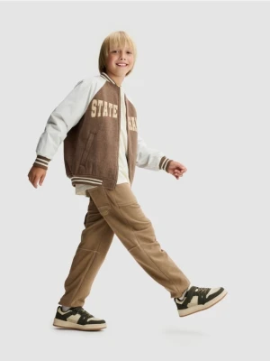 Reserved - Bawełniane spodnie jogger - brązowy