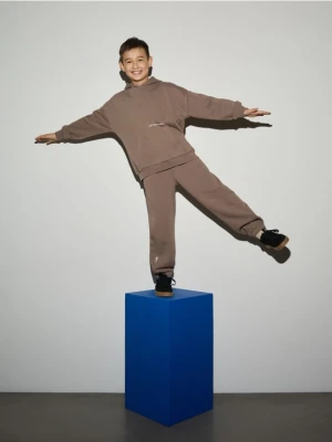 Reserved - Bawełniane spodnie jogger - brązowy