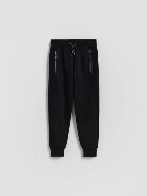 Reserved - Bawełniane spodnie jogger - czarny