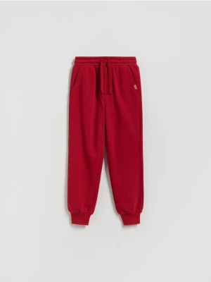 Reserved - Bawełniane spodnie jogger - czerwony