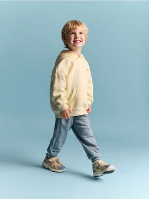 Reserved - Bawełniane spodnie jogger - jasnoniebieski