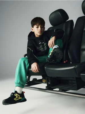 Reserved - Bawełniane spodnie jogger - miętowy