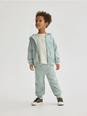 Reserved - Bawełniane spodnie jogger - niebieski