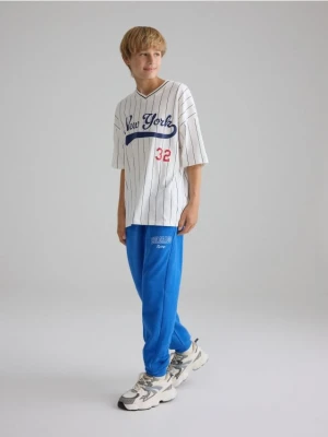 Reserved - Bawełniane spodnie jogger - niebieski