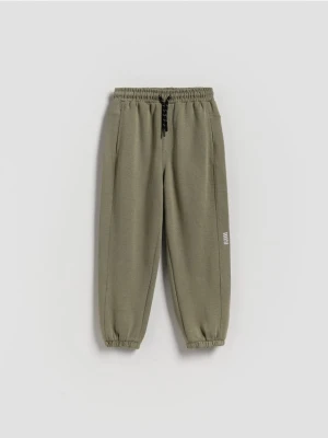 Reserved - Bawełniane spodnie jogger - oliwkowy