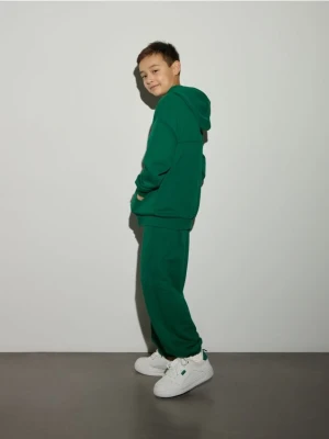 Reserved - Bawełniane spodnie jogger - zielony