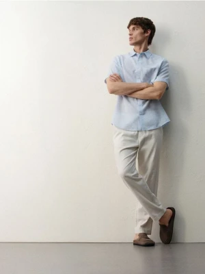 Reserved - Bawełniane spodnie jogger - złamana biel