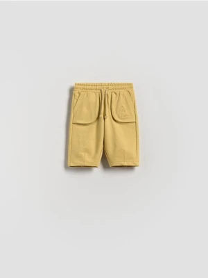 Reserved - Bawełniane spodnie - kremowy