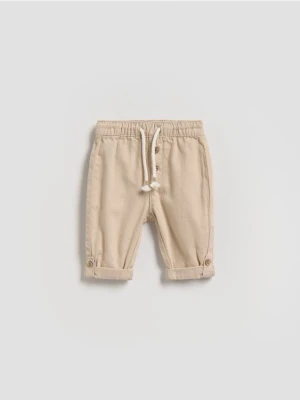 Reserved - Bawełniane spodnie - kremowy