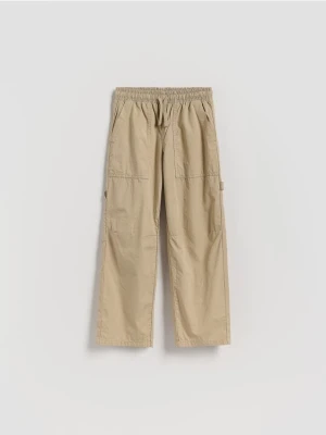 Reserved - Bawełniane spodnie parachute - beżowy