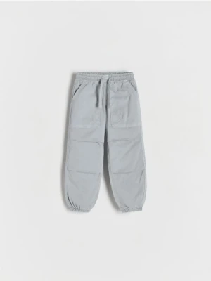 Reserved - Bawełniane spodnie parachute - jasnoszary