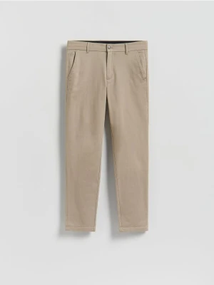 Reserved - Bawełniane spodnie slim fit - beżowy