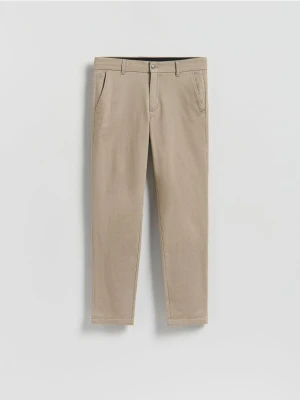 Reserved - Bawełniane spodnie slim fit - beżowy