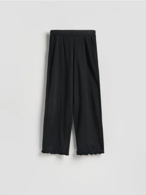 Reserved - Bawełniane spodnie z falbanką - czarny