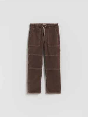 Reserved - Bawełniane spodnie z przeszyciami - ciemnobrązowy