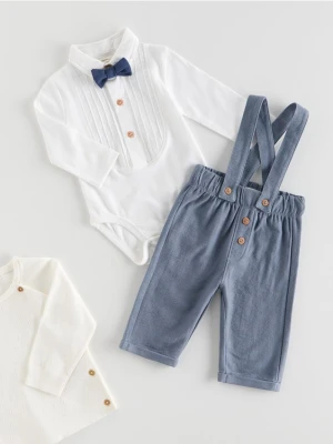 Reserved - Bawełniane spodnie z szelkami - jasnoniebieski