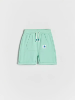Reserved - Bawełniane szorty z kieszenią - jasnoturkusowy