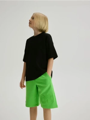 Reserved - Bawełniane szorty z tłoczeniem - zielony