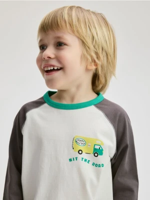 Reserved - Bawełniany longsleeve z nadrukiem - złamana biel