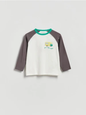 Zdjęcie produktu Reserved - Bawełniany longsleeve z nadrukiem - złamana biel