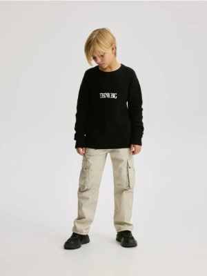 Reserved - Bawełniany sweter z nadrukiem - czarny