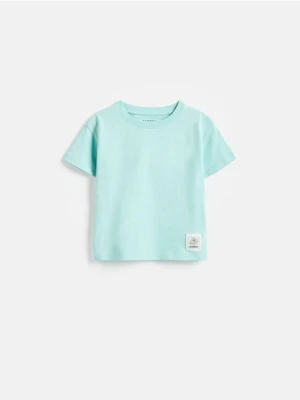 Reserved - Bawełniany t-shirt z naszywką - jasnoturkusowy
