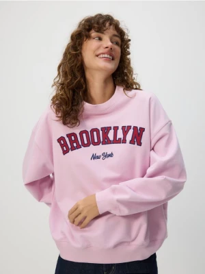 Reserved - Bluza z haftowanym napisem - różowy